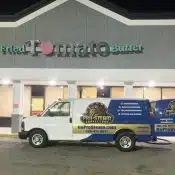 carpet cleaning van in front of fried tomato cafe